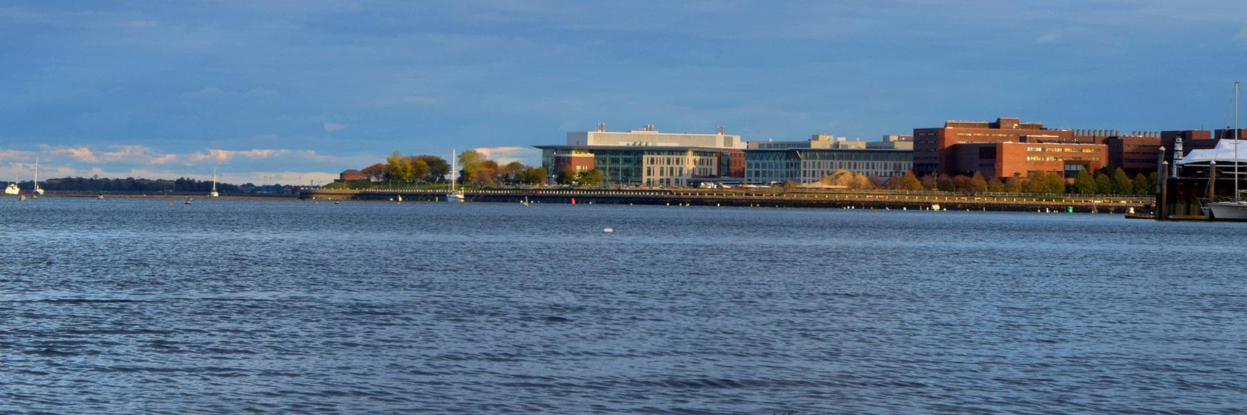 view of UMass Boston campus from Boston Harbor
